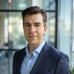 Portrait of Aaron Travis